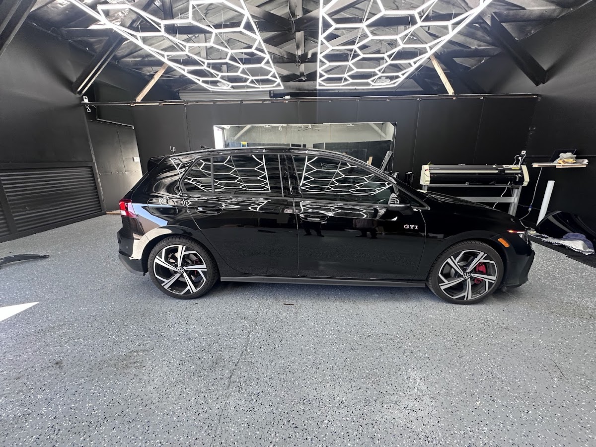 Completed vehicle window tinting by customer